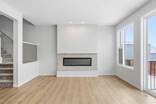 19815 44 Street Se, Calgary, AB - Indoor Photo Showing Living Room With Fireplace