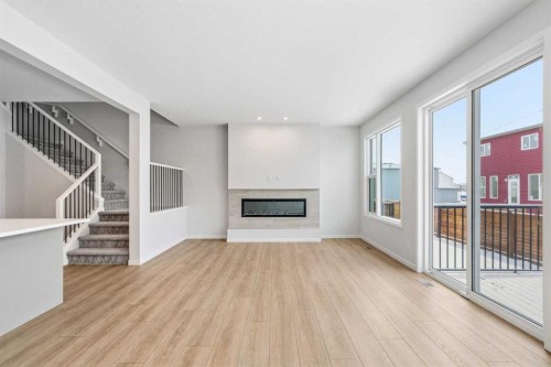 19815 44 Street Se, Calgary, AB - Indoor Photo Showing Other Room With Fireplace