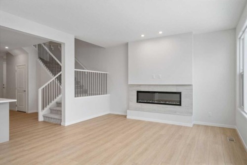 19815 44 Street Se, Calgary, AB - Indoor Photo Showing Living Room With Fireplace