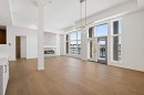 102-140 Marina Cove Se, Calgary, AB  - Indoor With Fireplace 