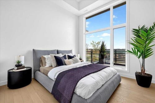 102-140 Marina Cove Se, Calgary, AB - Indoor Photo Showing Bedroom