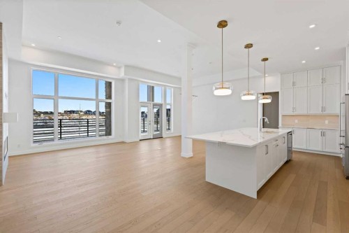 102-140 Marina Cove Se, Calgary, AB - Indoor Photo Showing Kitchen With Upgraded Kitchen