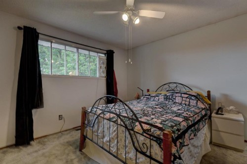 628 Cantrell Drive Sw, Calgary, AB - Indoor Photo Showing Bedroom