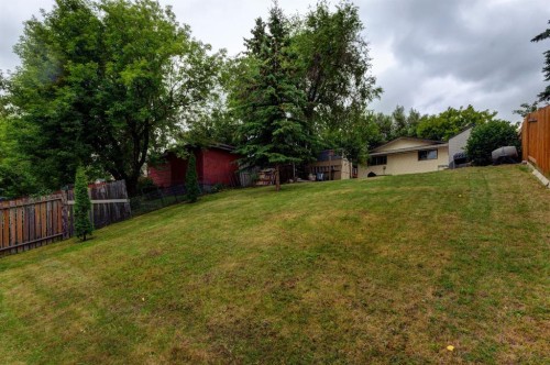 628 Cantrell Drive Sw, Calgary, AB - Outdoor With Backyard