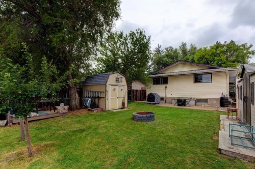 628 Cantrell Drive Sw, Calgary, AB - Outdoor With Backyard