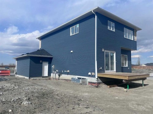 880 Hampshire Crescent Ne, High River, AB - Outdoor With Exterior