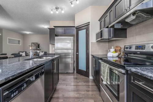 194 Kincora Glen Rise Nw, Calgary, AB - Indoor Photo Showing Kitchen With Double Sink With Upgraded Kitchen
