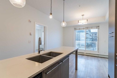 2205-76 Cornerstone Passage Ne, Calgary, AB - Indoor Photo Showing Kitchen With Double Sink