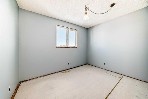 79 Aberdare Road Ne, Calgary, AB - Indoor Photo Showing Other Room