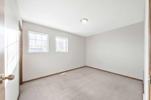 154 Bridleridge Circle Sw, Calgary, AB - Indoor Photo Showing Other Room