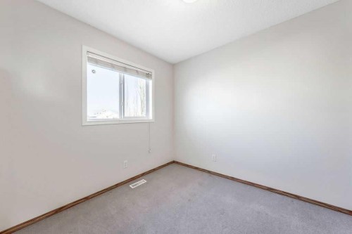 154 Bridleridge Circle Sw, Calgary, AB - Indoor Photo Showing Other Room