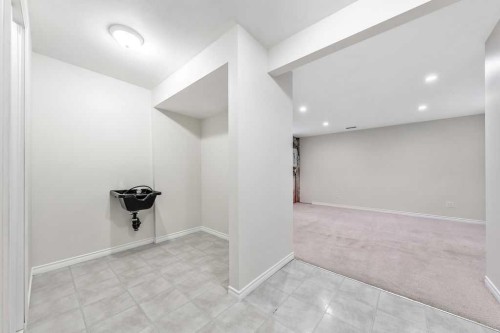 154 Bridleridge Circle Sw, Calgary, AB - Indoor Photo Showing Other Room