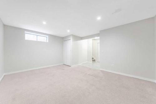 154 Bridleridge Circle Sw, Calgary, AB - Indoor Photo Showing Basement