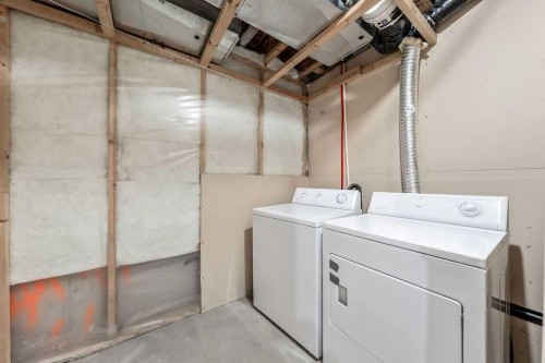 154 Bridleridge Circle Sw, Calgary, AB - Indoor Photo Showing Laundry Room