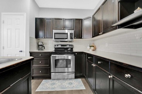 2101 Luxstone Boulevard Sw, Airdrie, AB - Indoor Photo Showing Kitchen