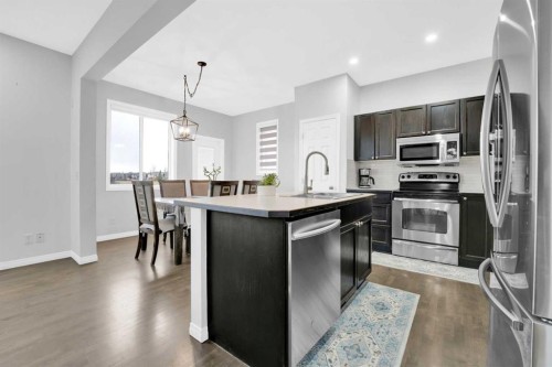 2101 Luxstone Boulevard Sw, Airdrie, AB - Indoor Photo Showing Kitchen With Upgraded Kitchen
