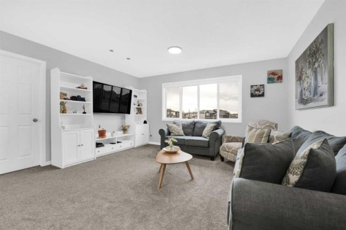 2101 Luxstone Boulevard Sw, Airdrie, AB - Indoor Photo Showing Living Room