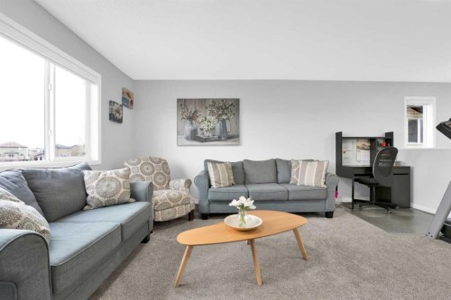 2101 Luxstone Boulevard Sw, Airdrie, AB - Indoor Photo Showing Living Room