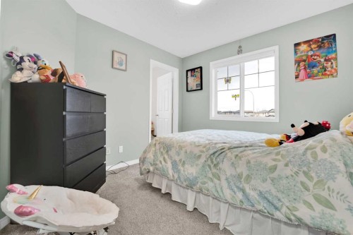 2101 Luxstone Boulevard Sw, Airdrie, AB - Indoor Photo Showing Bedroom