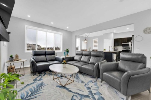 2101 Luxstone Boulevard Sw, Airdrie, AB - Indoor Photo Showing Living Room