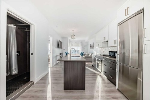 304-1521 26 Avenue Sw, Calgary, AB - Indoor Photo Showing Kitchen With Upgraded Kitchen