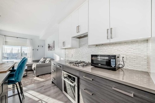 304-1521 26 Avenue Sw, Calgary, AB - Indoor Photo Showing Kitchen With Upgraded Kitchen