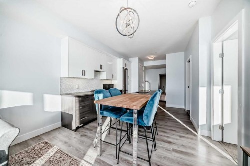 304-1521 26 Avenue Sw, Calgary, AB - Indoor Photo Showing Dining Room