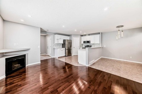 95 Hidden Creek Rise Nw, Calgary, AB - Indoor With Fireplace