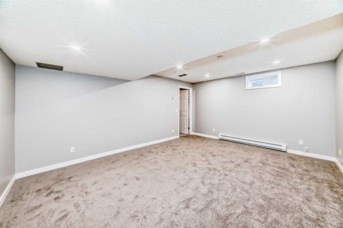 95 Hidden Creek Rise Nw, Calgary, AB - Indoor Photo Showing Basement