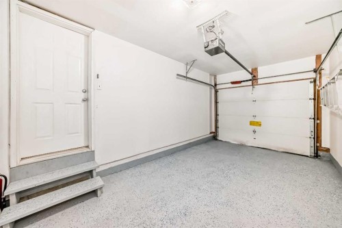 95 Hidden Creek Rise Nw, Calgary, AB - Indoor Photo Showing Garage