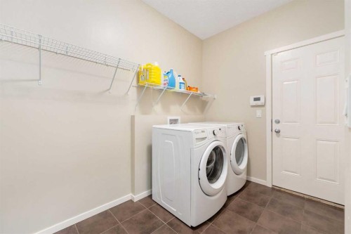 72 Walden Heights Se, Calgary, AB - Indoor Photo Showing Laundry Room