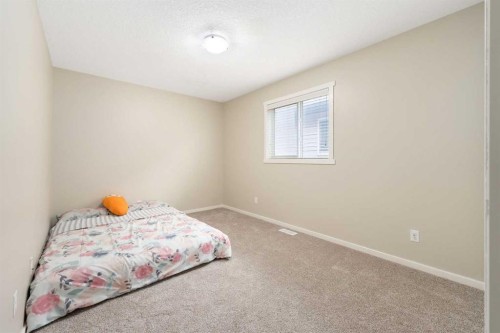 72 Walden Heights Se, Calgary, AB - Indoor Photo Showing Bedroom
