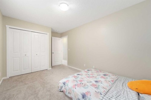 72 Walden Heights Se, Calgary, AB - Indoor Photo Showing Bedroom