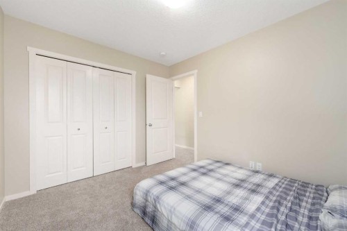 72 Walden Heights Se, Calgary, AB - Indoor Photo Showing Bedroom
