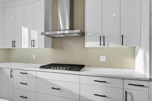 98 Waterford Crescent, Chestermere, AB - Indoor Photo Showing Kitchen With Upgraded Kitchen