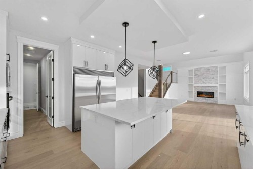 98 Waterford Crescent, Chestermere, AB - Indoor Photo Showing Kitchen With Upgraded Kitchen