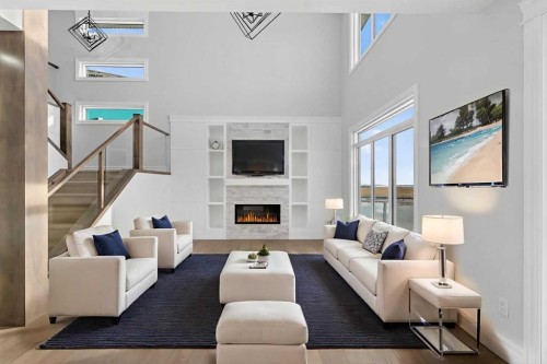 98 Waterford Crescent, Chestermere, AB - Indoor Photo Showing Living Room With Fireplace