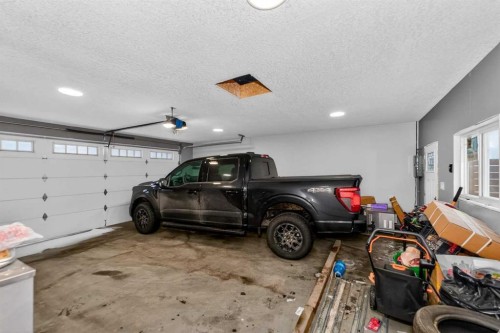 1072 Cornerstone Street Ne, Calgary, AB - Indoor Photo Showing Garage