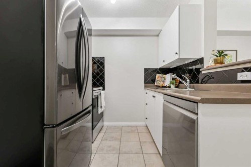 1208-2395 Eversyde Avenue Sw, Calgary, AB - Indoor Photo Showing Kitchen