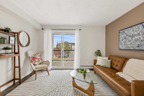 1208-2395 Eversyde Avenue Sw, Calgary, AB - Indoor Photo Showing Living Room