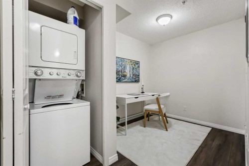 1208-2395 Eversyde Avenue Sw, Calgary, AB - Indoor Photo Showing Laundry Room
