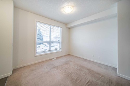 234 Cranston Way Se, Calgary, AB - Indoor Photo Showing Other Room