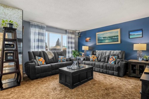 48 Marbank Place Ne, Calgary, AB - Indoor Photo Showing Living Room