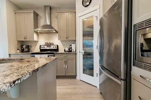 178 Livingston Avenue Ne, Calgary, AB - Indoor Photo Showing Kitchen With Stainless Steel Kitchen With Upgraded Kitchen