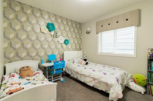 178 Livingston Avenue Ne, Calgary, AB - Indoor Photo Showing Bedroom