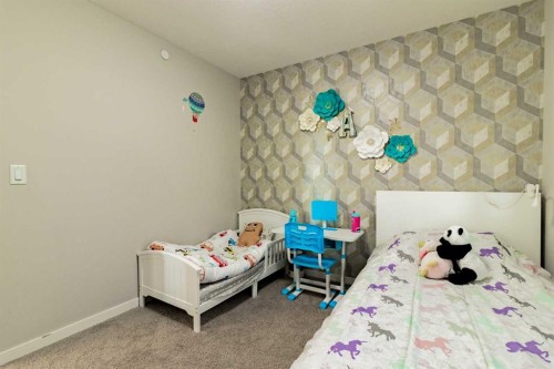 178 Livingston Avenue Ne, Calgary, AB - Indoor Photo Showing Bedroom