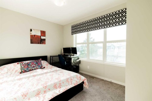 178 Livingston Avenue Ne, Calgary, AB - Indoor Photo Showing Bedroom