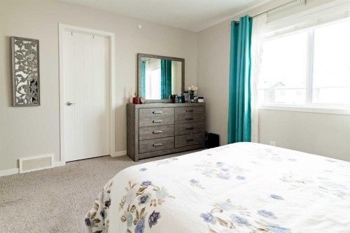 178 Livingston Avenue Ne, Calgary, AB - Indoor Photo Showing Bedroom