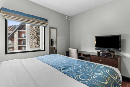 322-901 Mountain Street, Canmore, AB - Indoor Photo Showing Bedroom