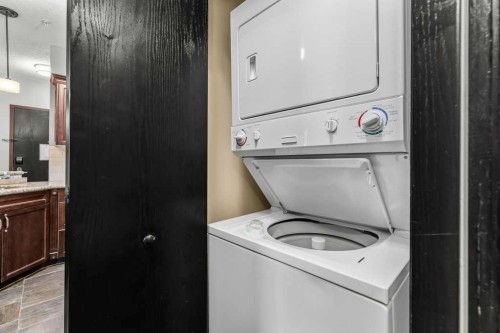 322-901 Mountain Street, Canmore, AB - Indoor Photo Showing Laundry Room